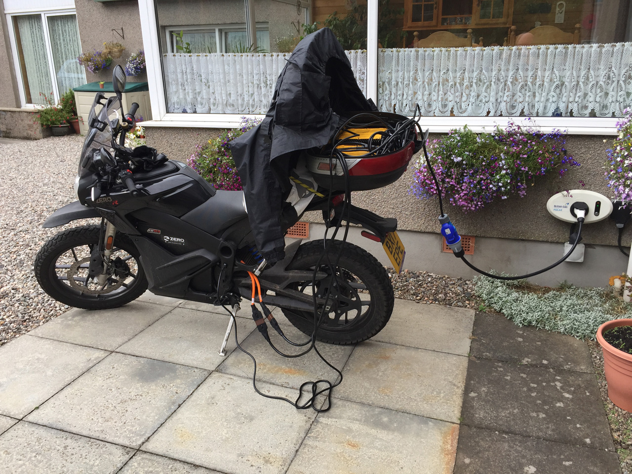 John Chivers' Zero DSR electric motorcycle charging at Fendoch Guest House, Crieff.
