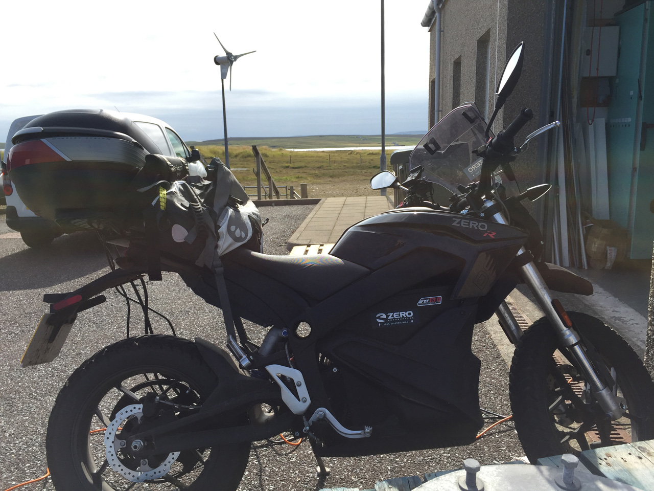 John Chivers' Zero DSR electric motorcycle charging at the Pure Energy Centre, Unst, Shetland.